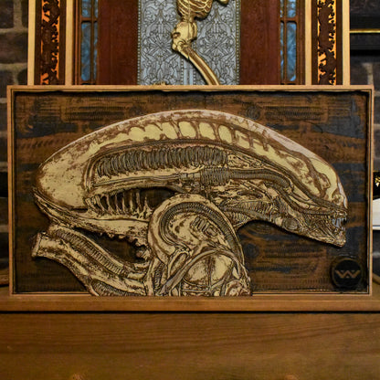 Hand-painted maple wood alien xenomorph artwork, inspired by Giger’s sci-fi designs.