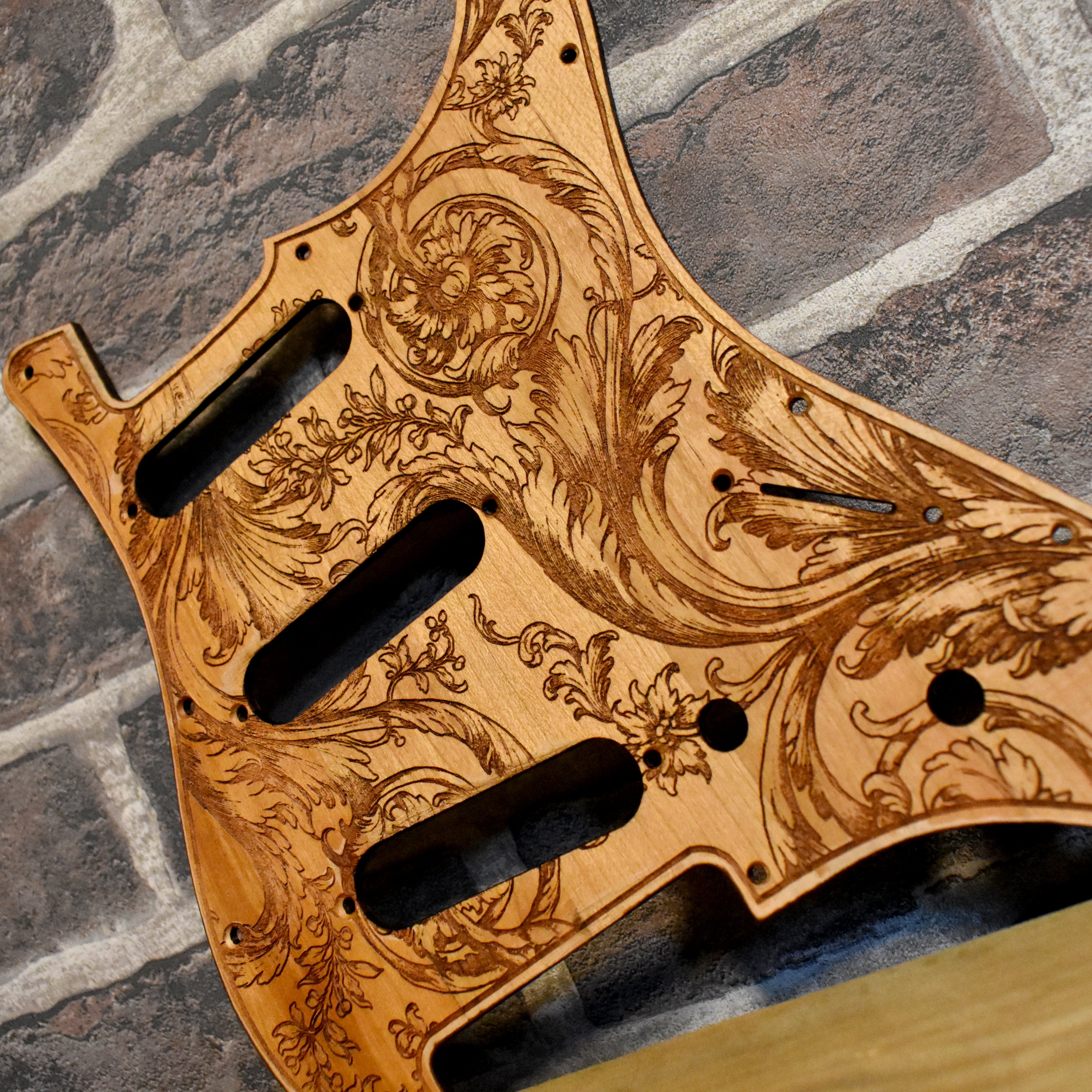 Unique engraved wooden pickguard for Strato HSS and SSS guitars, floral-inspired design