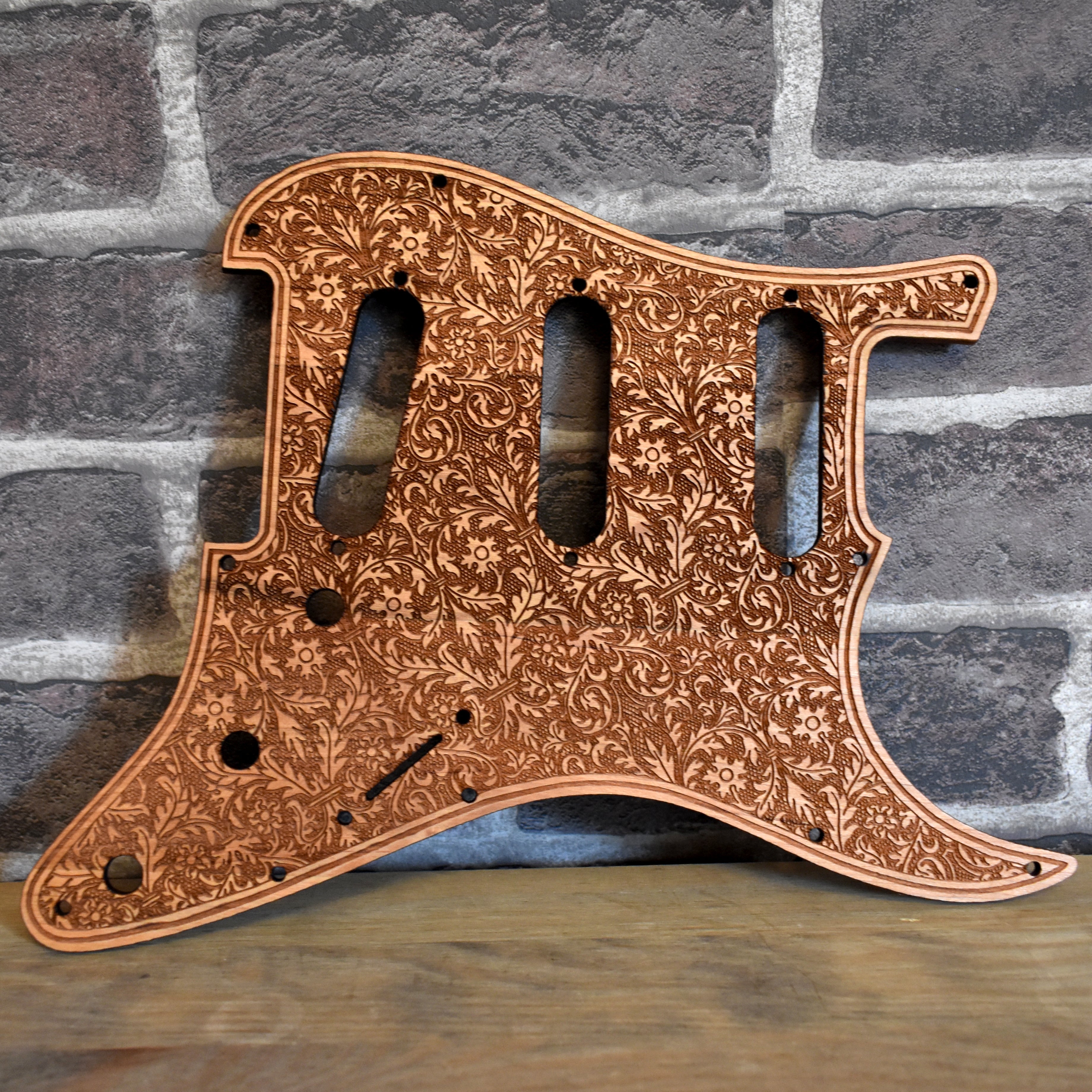 Fender Stratocaster cherry wood pickguard with laser-engraved Aztec design, HSS & SSS compatible