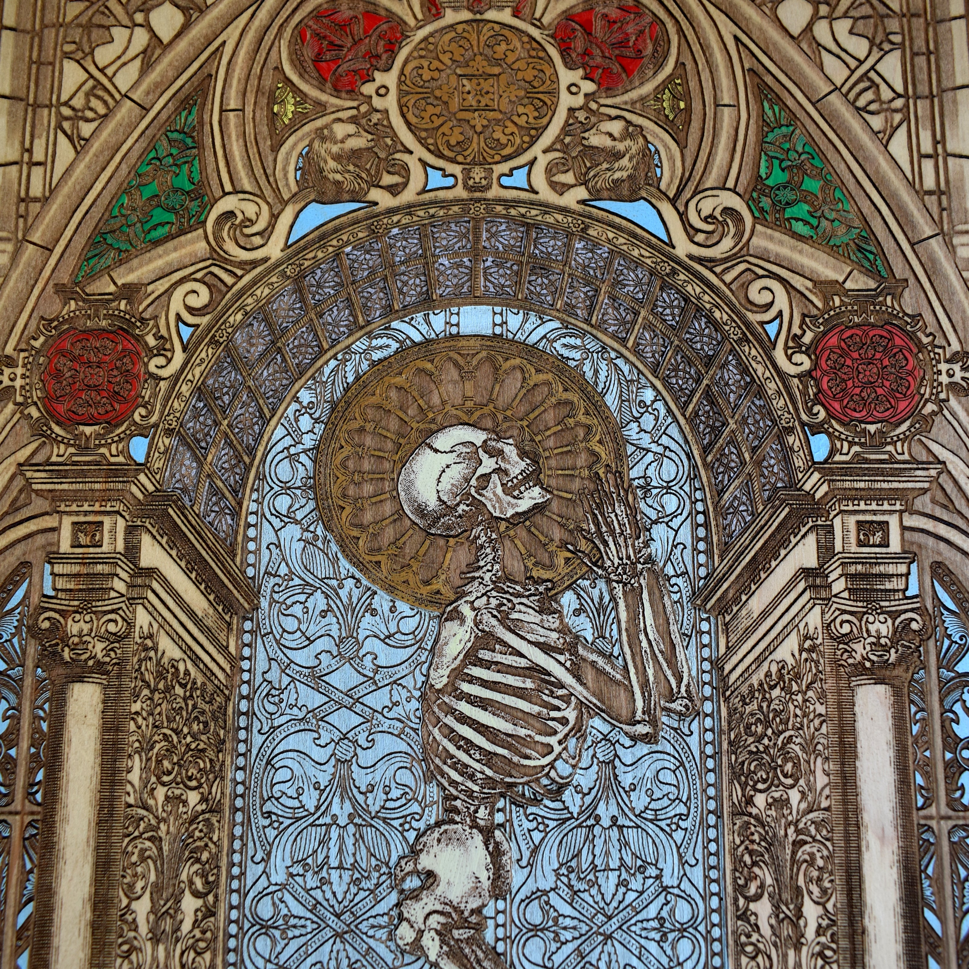 Wooden wall art featuring a hand-painted human skeleton in a prayer pose, with Memento Mori symbolism. Made from solid maple wood, customizable with a name, date, or special message. A meaningful gift.