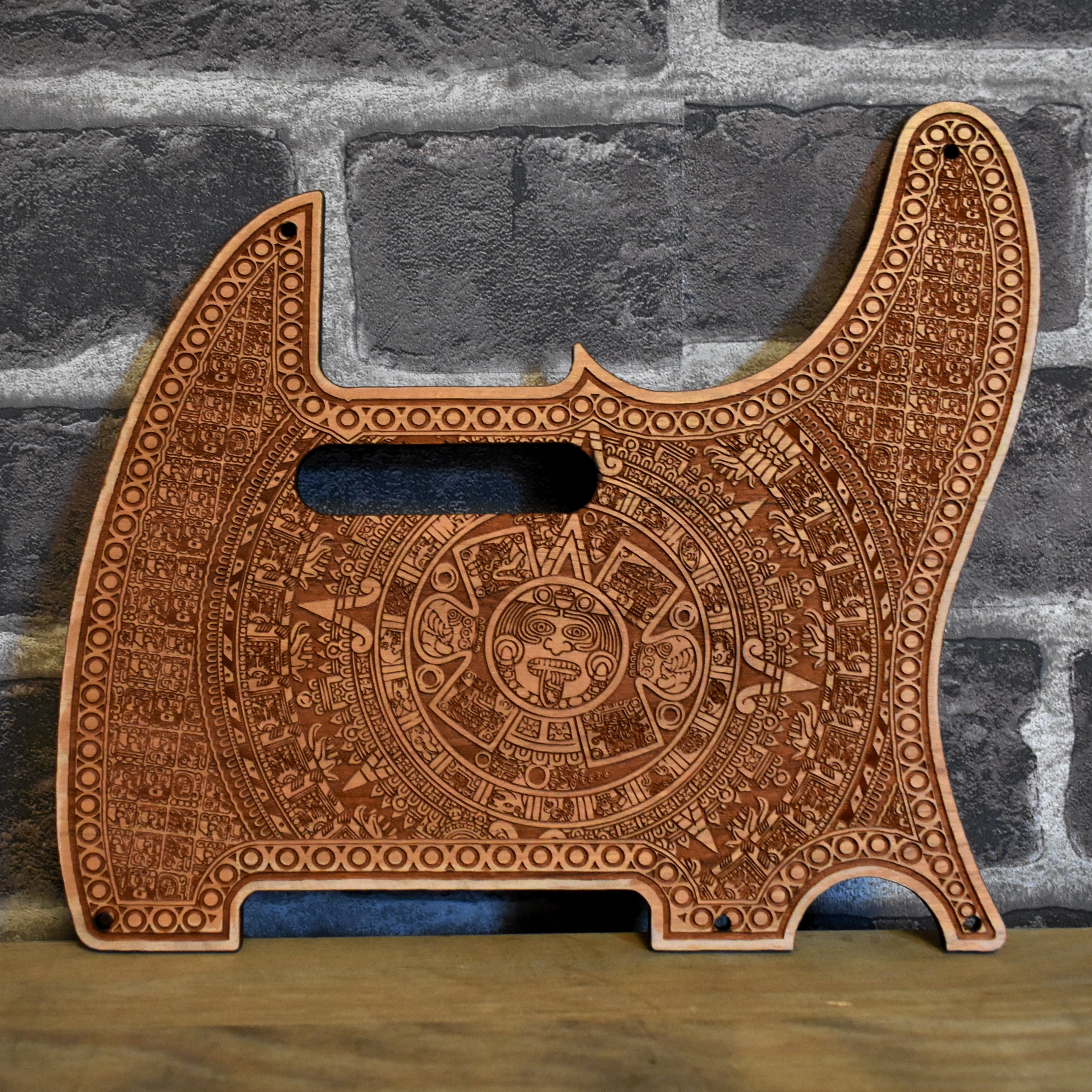 Fender Telecaster cherry wood pickguard – laser engraved, handcrafted, and custom-designed.