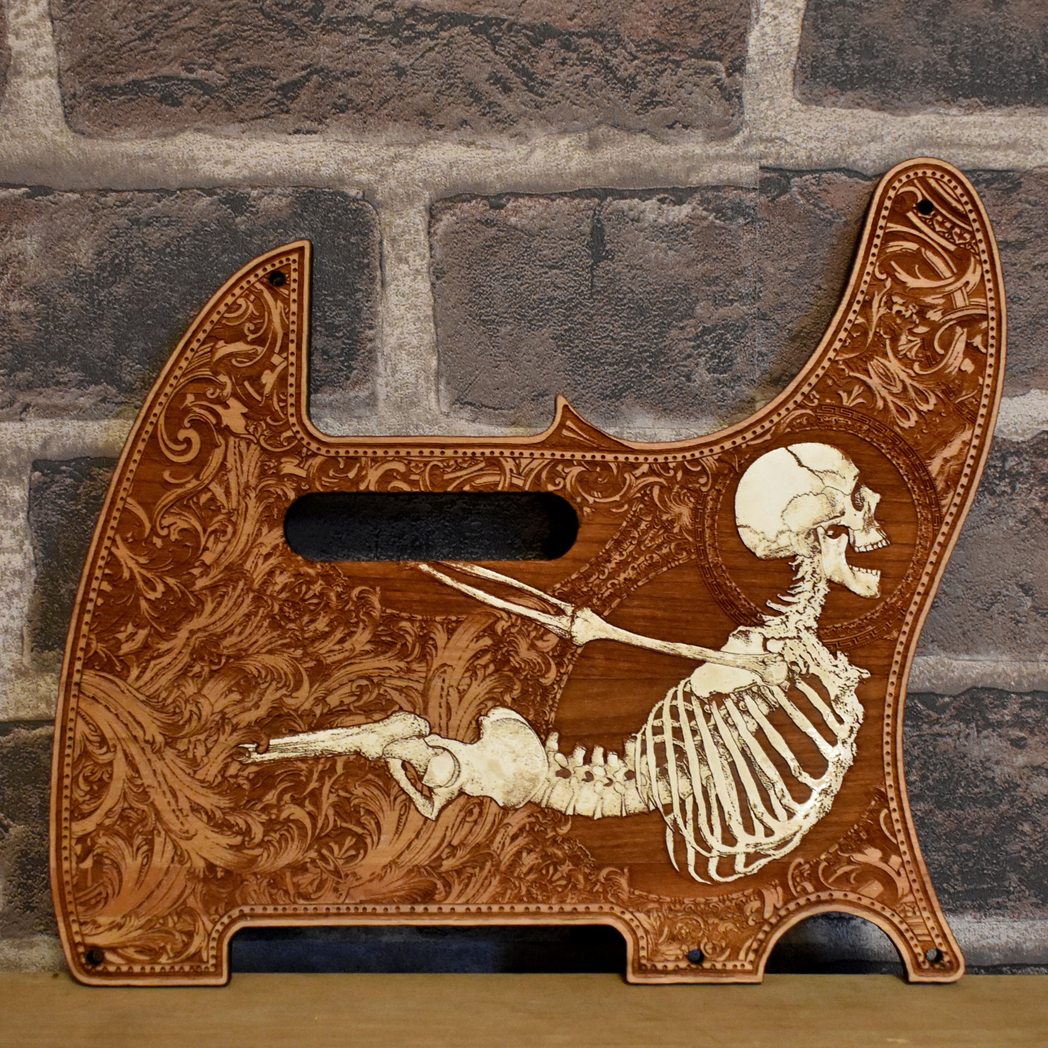 Fender Telecaster wood pickguard in cherry, laser-engraved skull, hand-painted finish