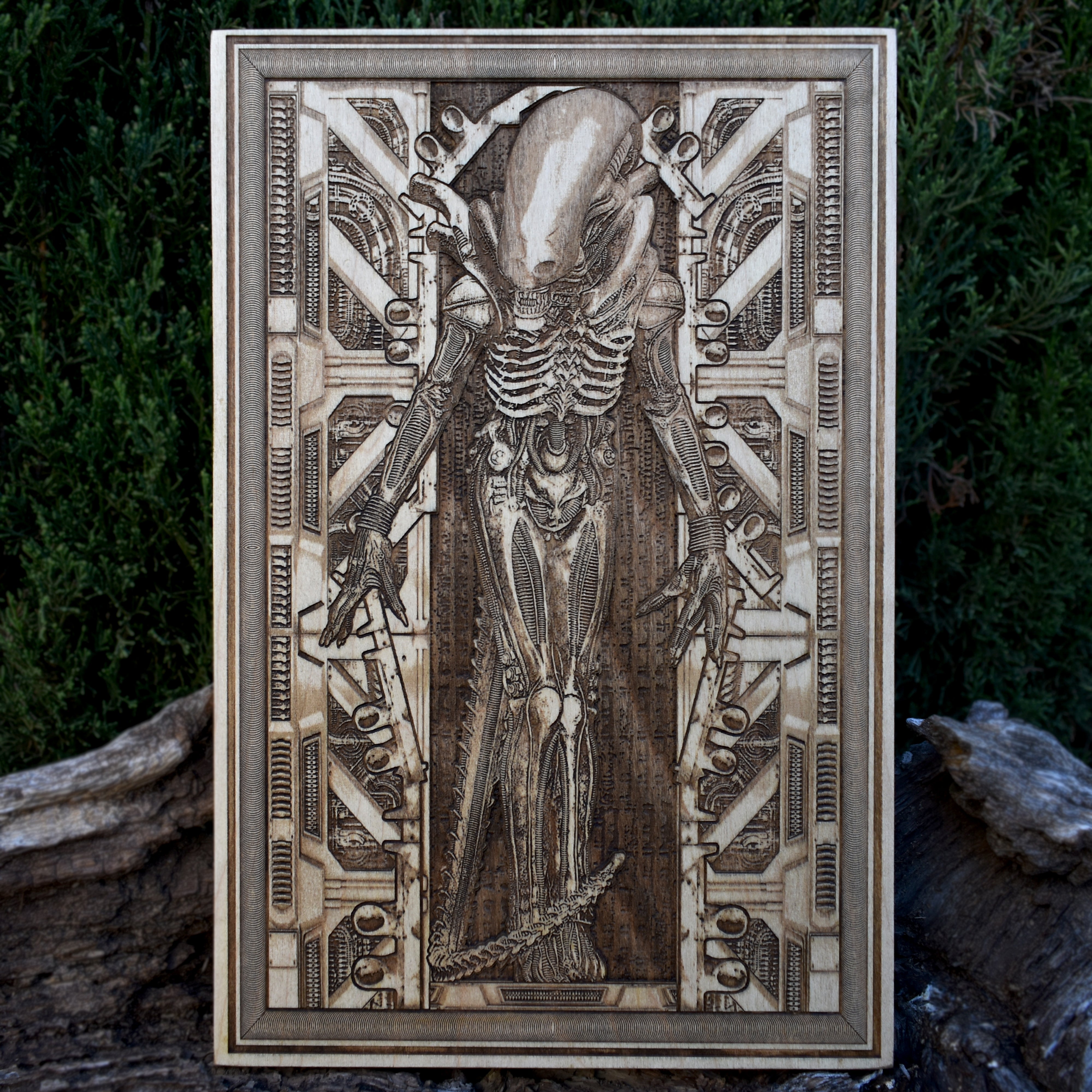 Handcrafted alien wood wall art inspired by sci-fi horror movies