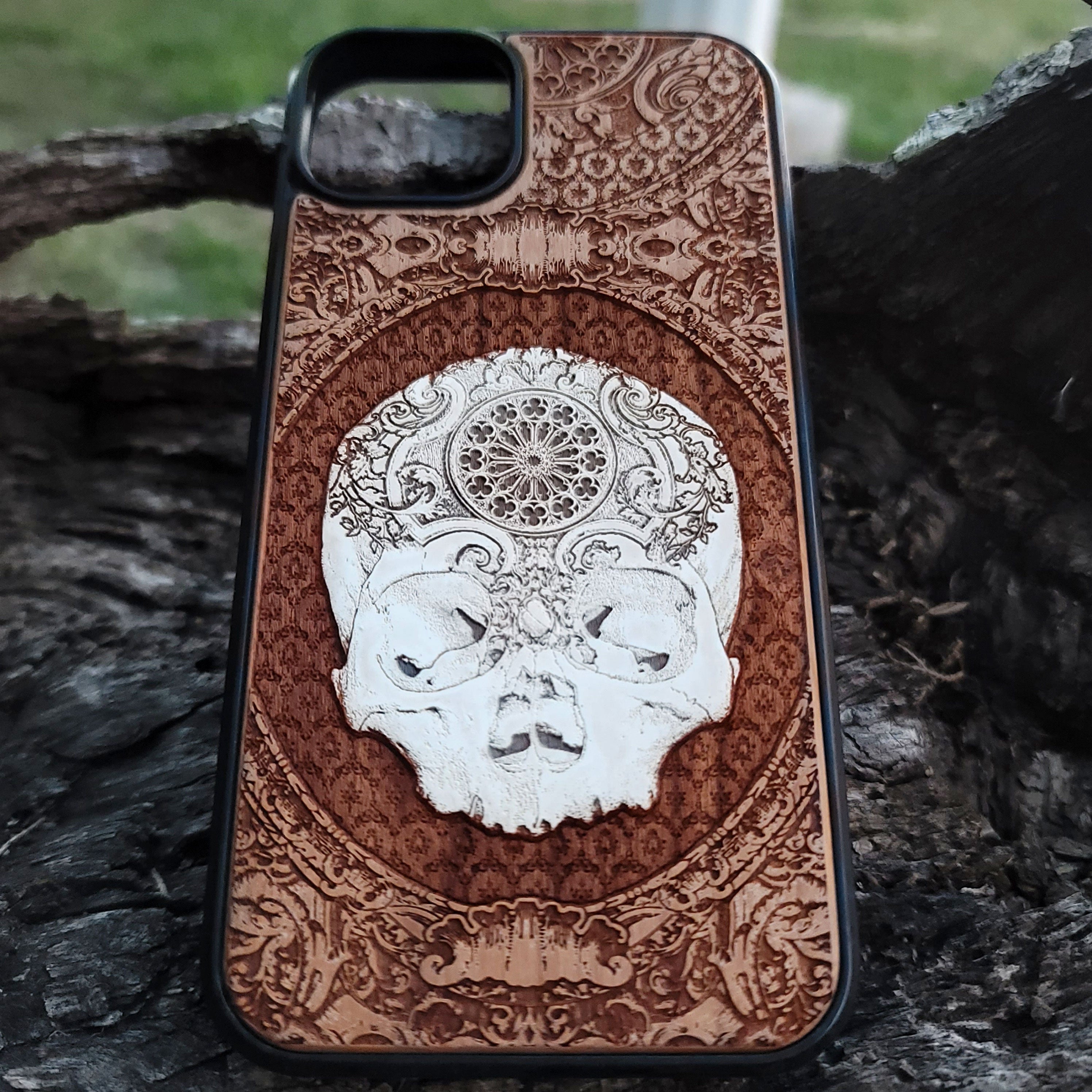 Dark gothic skull phone case, laser-engraved and hand-painted on premium wood for a unique horror-inspired style.