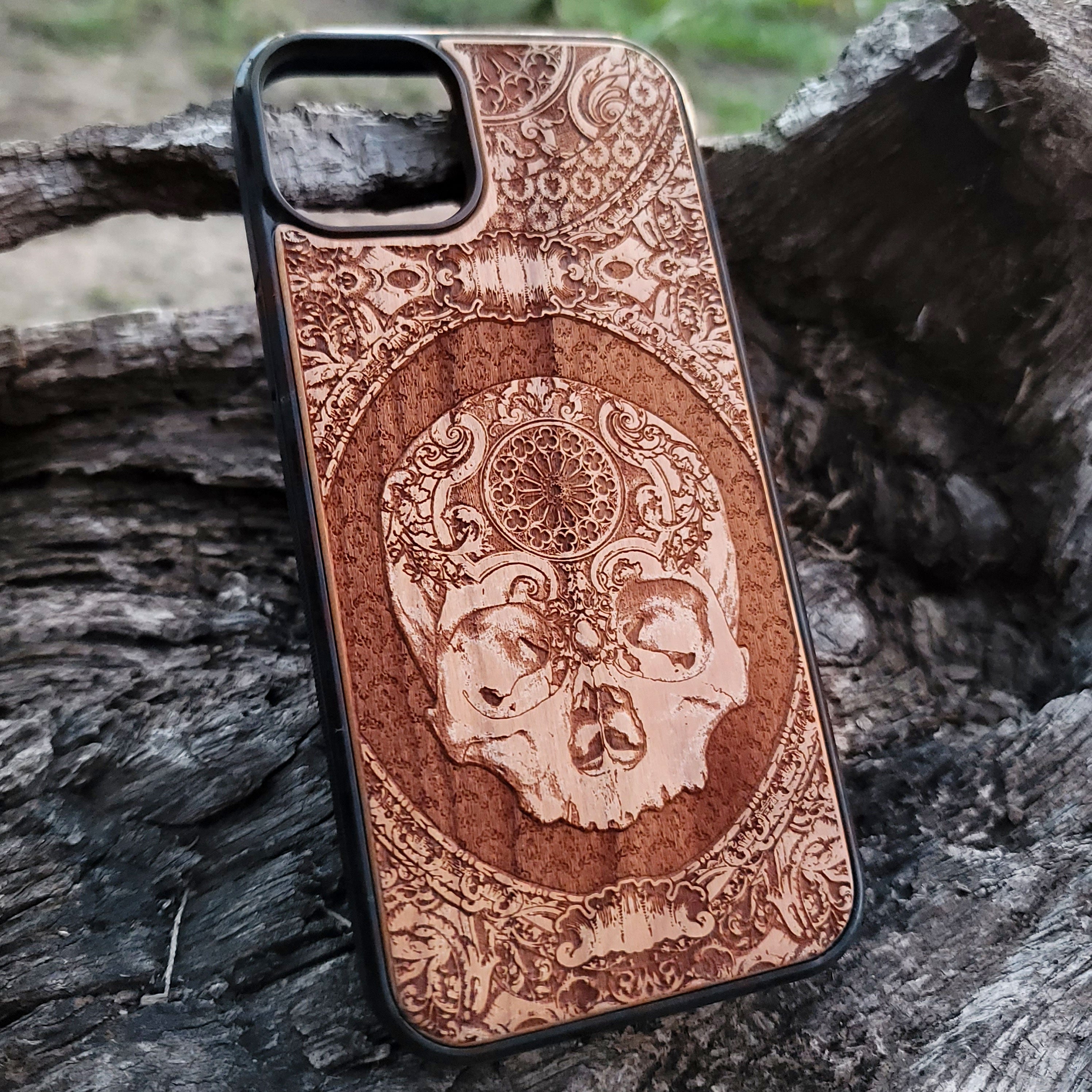 Dark Art Wood Phone Case – Unique hand-engraved gothic skull pattern on wood, blending eerie aesthetics with premium craftsmanship.