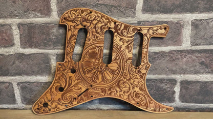 Custom Stratocaster pickguard, floral wood design compatible with HSS and SSS setups.