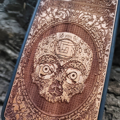 Aztec Skull wooden phone case featuring a detailed laser-engraved design. Compatible with iPhone 16, iPhone 15, Galaxy S25, Note 20, and other popular models. Ideal for fans of gothic, dark, and ancient art designs